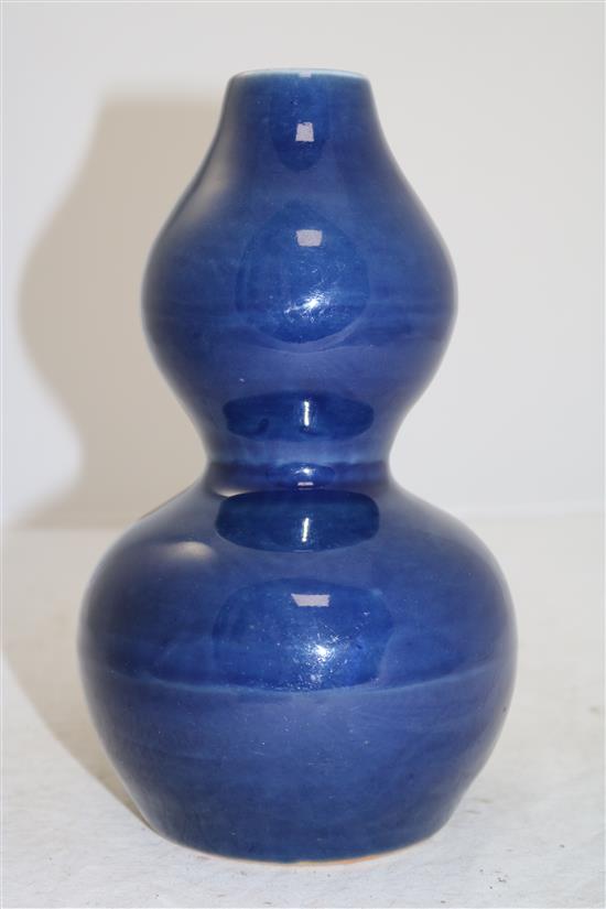 A Chinese blue monochrome double-gourd vase, Wanli six character mark and probably of the period, height 22.5cm